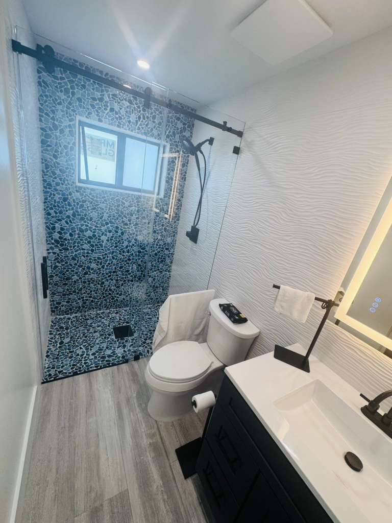 Pebble shower bathroom - after